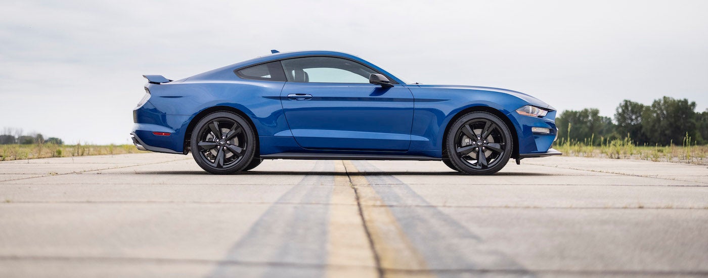 A blue 2022 Ford Mustang Stealth Edition is shown after leaving a used Ford dealer.