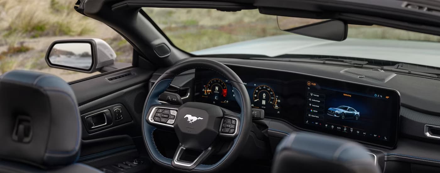 Front seating and dashboard in a 2026 Ford Mustang