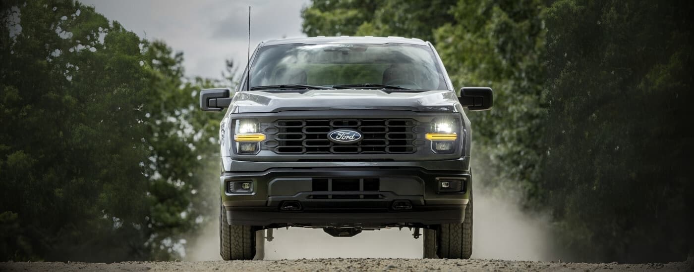 A black 2025 Ford F-150 off-roading.